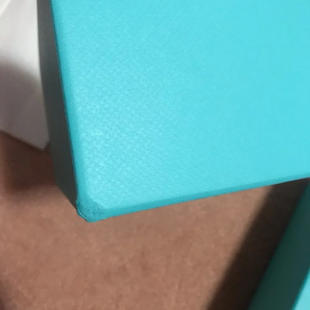 Tiffany box in very good condition plus a small bag of